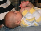 Caleb eating his feet.