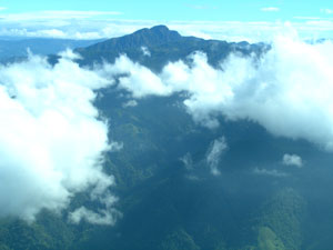 In flight: mountains and clouds