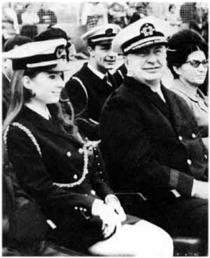 [Diana and Hubbard in Sea Org uniforms]