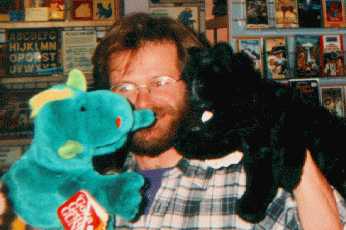Me playing with skunk and dragon puppets