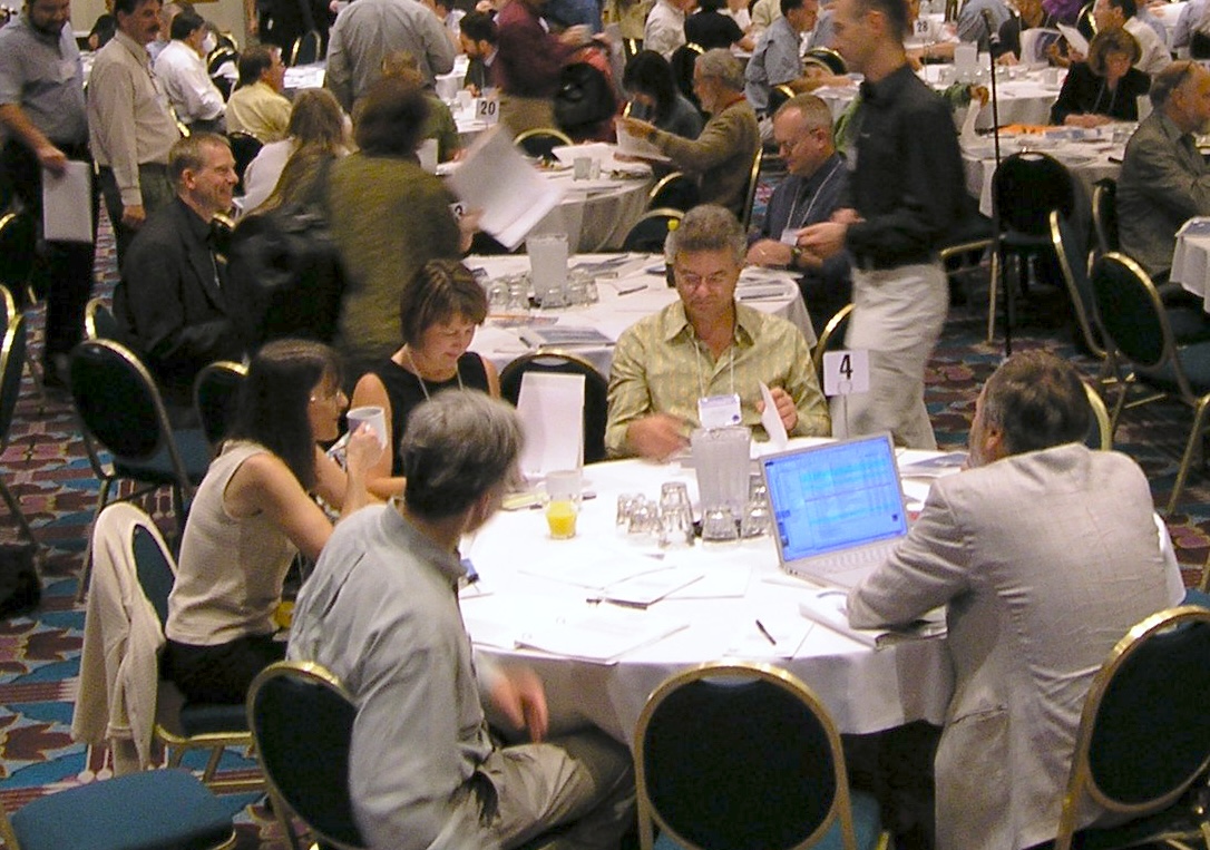 Principal investigators for National Science Foundation Information Technology Research (ITR) program meeting. Front left, Susan Fussell and Pamela Hinds.