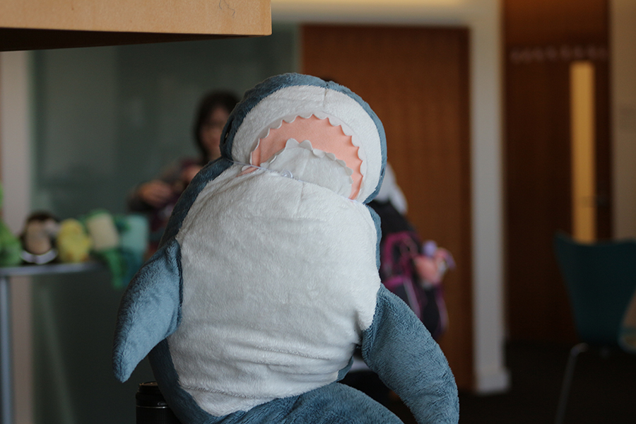 A stuffed shark, baring its teeth.