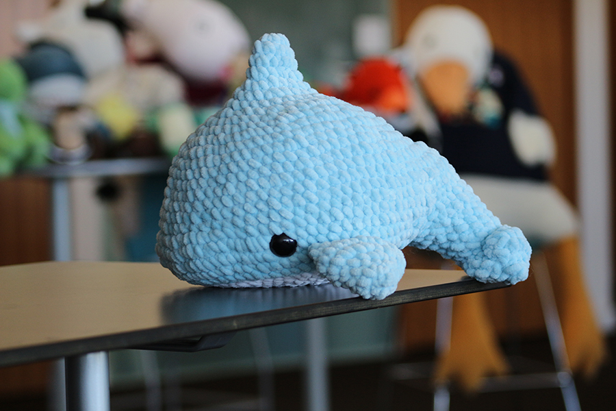 A blue stuffed whale.