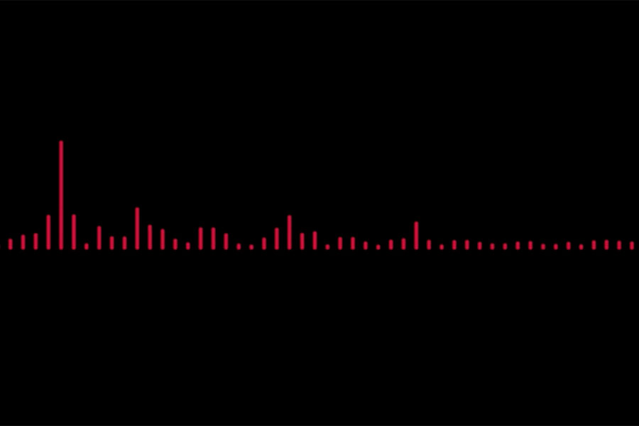 Red audio waves against a black background.