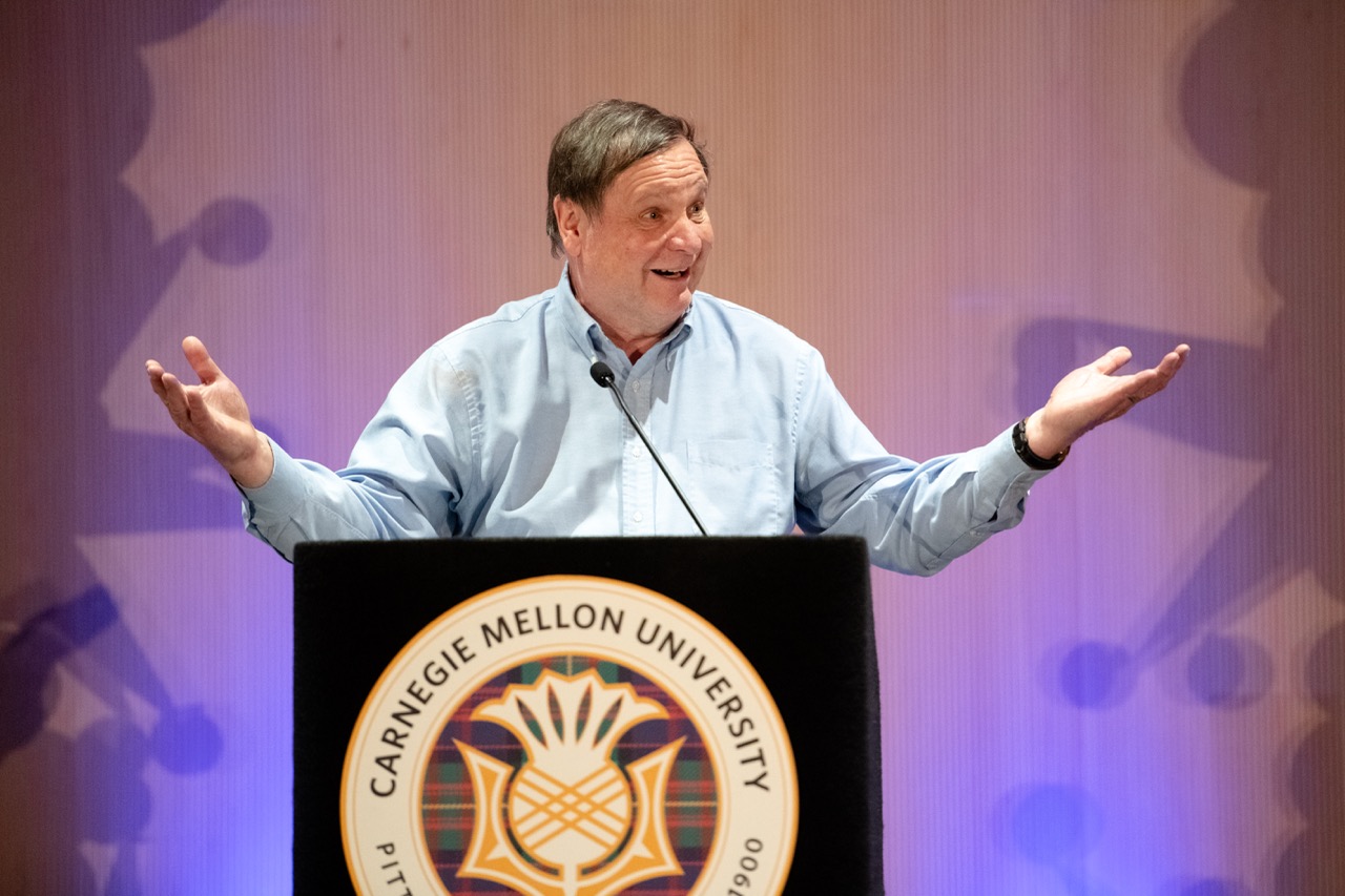 Mark at the podium during the Stehlik Leaves His Mark Celebration on April 5, 2025.