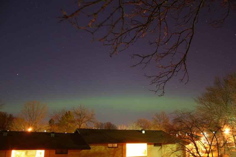 After local midnight, aurora started as a quiet green arc.